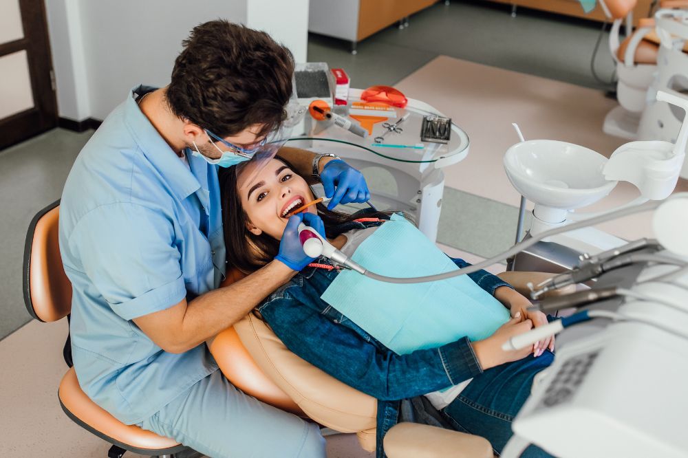 a women is getting dental treatment